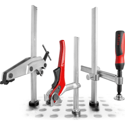 Spannelement für Schweißtische mit variabler Ausladun